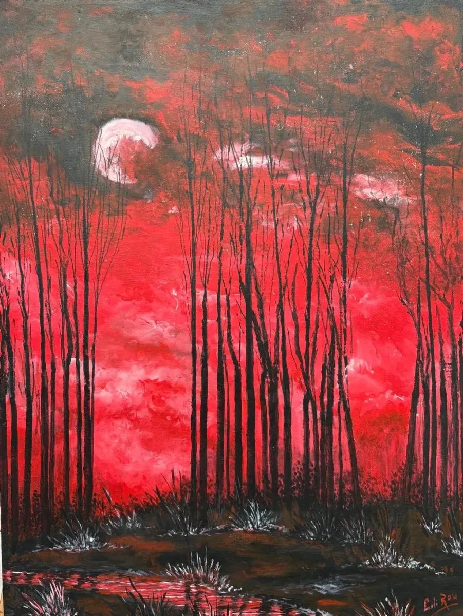 Bosque en rojo con luna llena